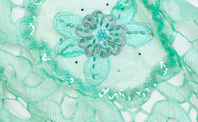 sea green daffodil sequined lace fabric banner 1